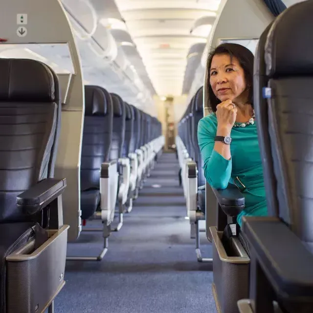 Melinda Yee Franklin sitting on a plane